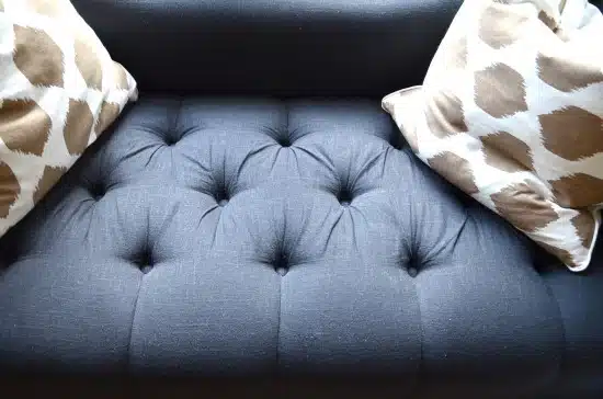 tufted settee in black linen