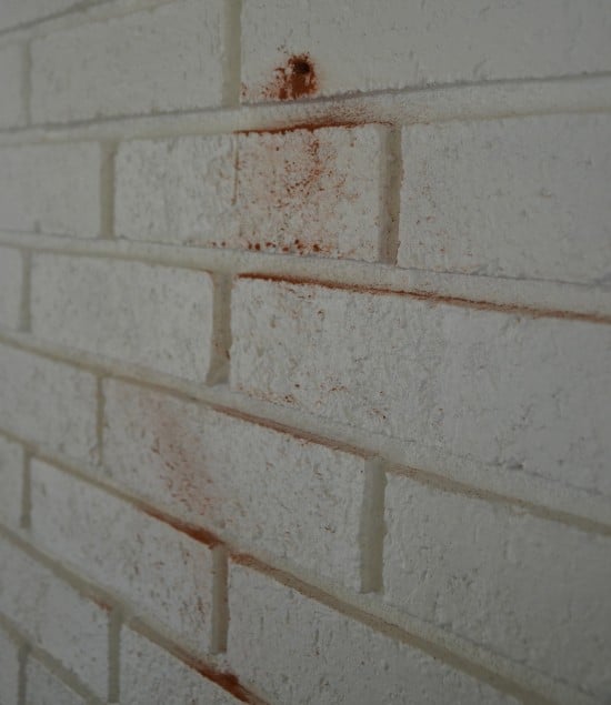 how to make a hole in a brick fireplace