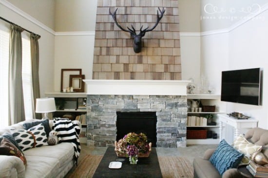 jdc-living-room-with-shingled-fireplace-antlers