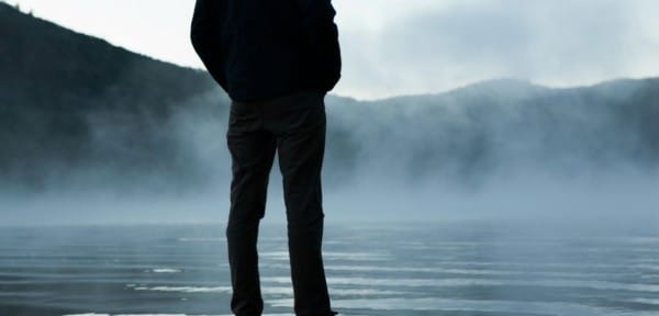 man-standing-by-foggy-lake-smaller-1014x487