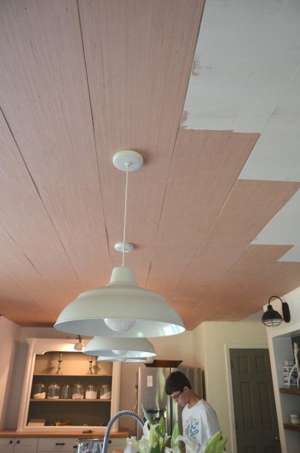 wood ceiling over popcorn ceiling